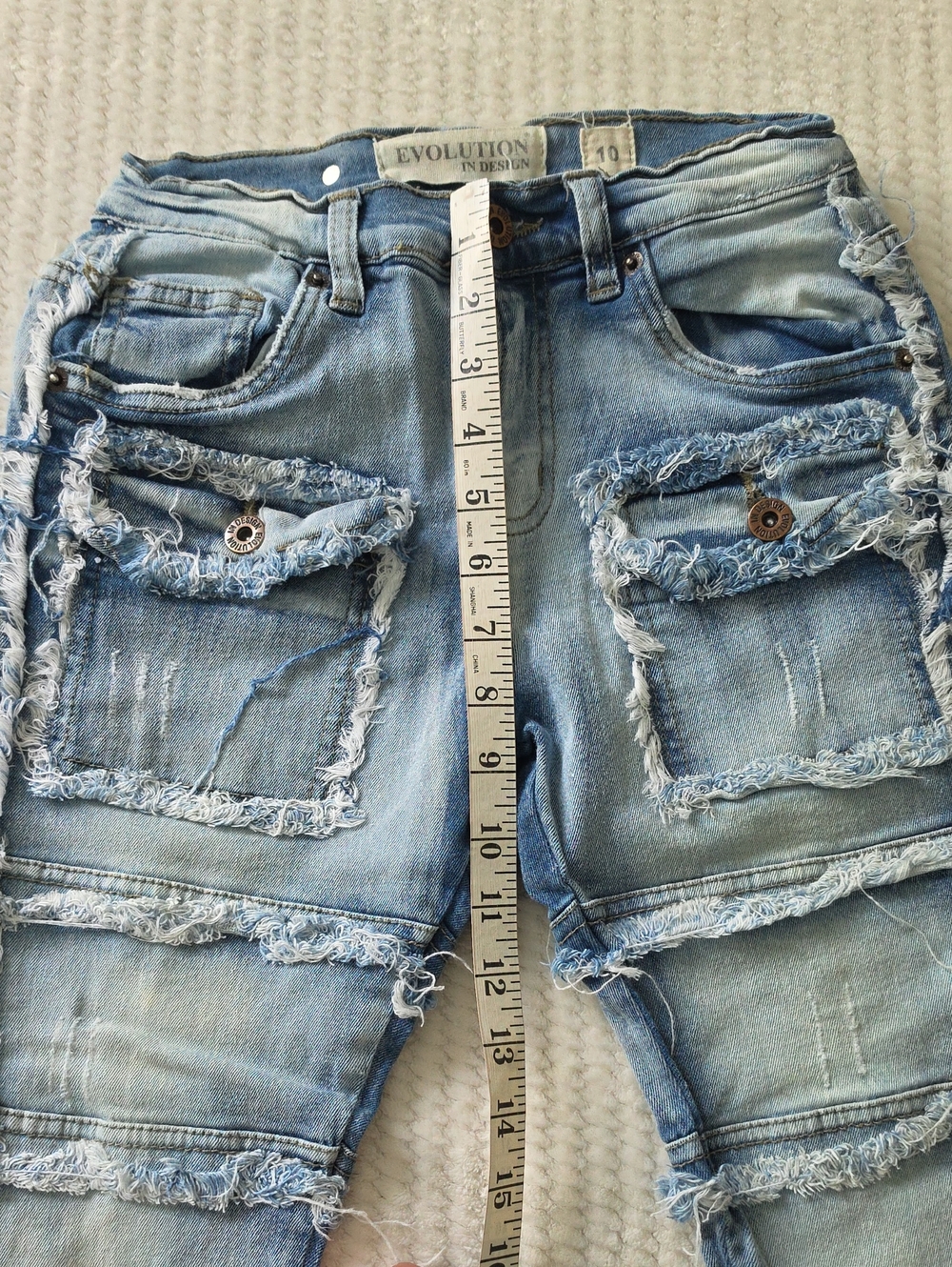 Evolution In Design Blue Jeans - Picture 2 of 11